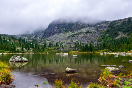 Mountain lake in the clouds. Ergaki, Krasnoyarsk Territory, Siberia, Russia