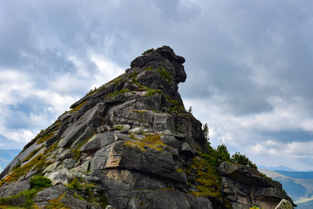 Mountain landscape with high rocks and cloudy sky. Ergaki, Krasnoyarsk Territory, Siberia, Russiaの写真素材