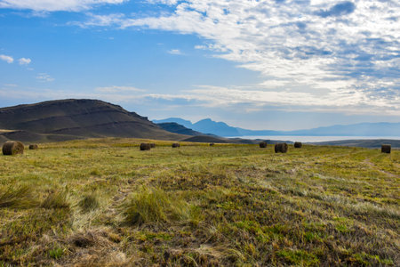 Landscape with hay bales in the steppe ofKhakassia, Siberia, Russiaの写真素材