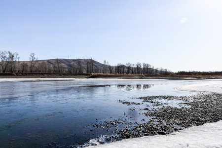 The ice on the river. picturesque spring landscape with river ice and blue sky.の写真素材