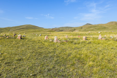 Khakassia cemetery in grassland under blue sky, Khakassia, Siberia, Russiaの写真素材