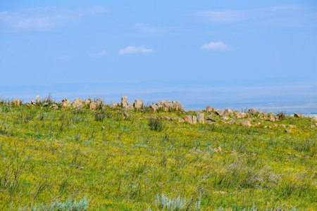 Stone wall on the prairie in the steppe. Khakassia, Siberia, Russiaの写真素材