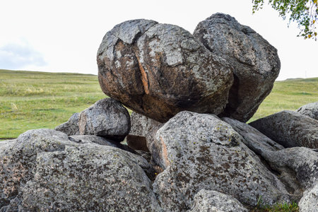 Large granite boulders on a hillside in the north of Khakassia, Siberia, Russia, Sahsyrの写真素材