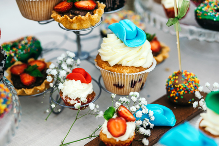 Candy bar cupcakes decorated in cowboy style. Huge selection of Goodies.の写真素材