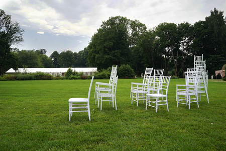 Chiavari chairs on grass.の写真素材