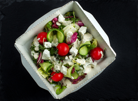 Greek salad with brynza top view.の写真素材