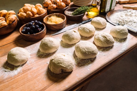 Dough for buns. Ingredients for homemade bread. Overall plan.の写真素材