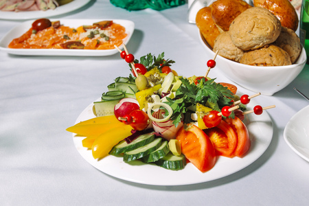 Fresh vegetable salad with tomato, cucumber.の写真素材