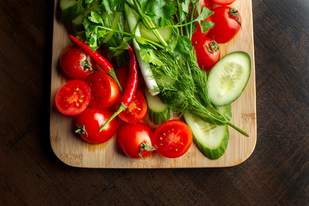 Wooden plank with vegetables for a vegetarian salad 2の写真素材