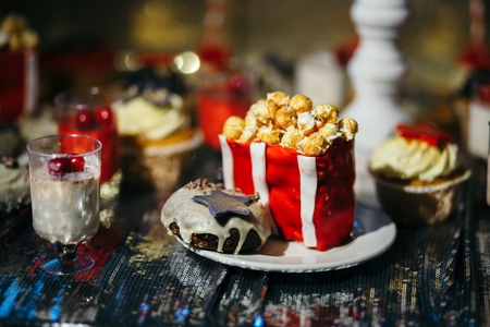 Cake and chocolate frosting decorated the top with popcorn. Close-upの写真素材