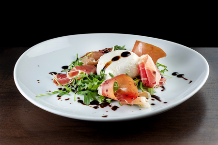 Salad with bacon and soft cheese.の写真素材