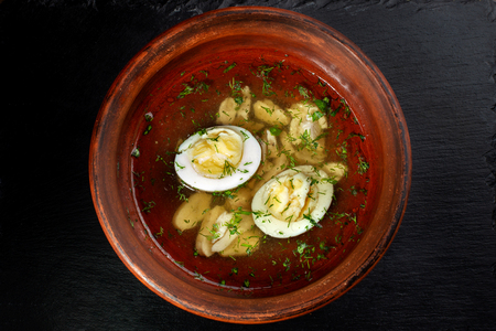 Chicken broth with dill and egg.の写真素材