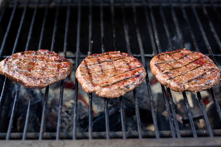 Barbecue juicy grilled burger cutlets from fresh beef.の写真素材