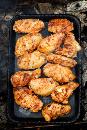 Chicken wings on barbecue grill.の写真素材