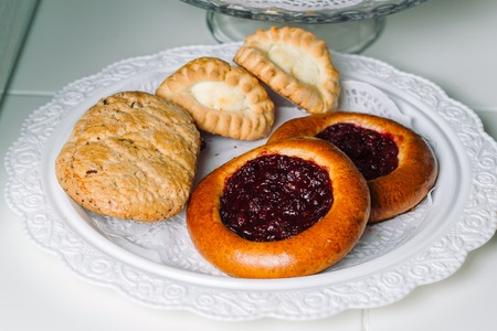 Buns with various fillings, jam and curd.の写真素材