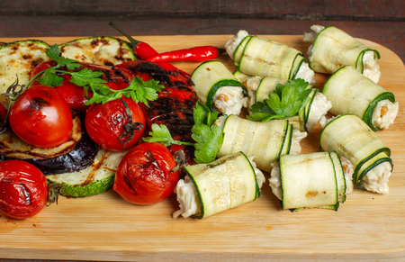 Grilled vegetables. Zucchini, forged zucchini, pepper. Zucchini rolls.の写真素材