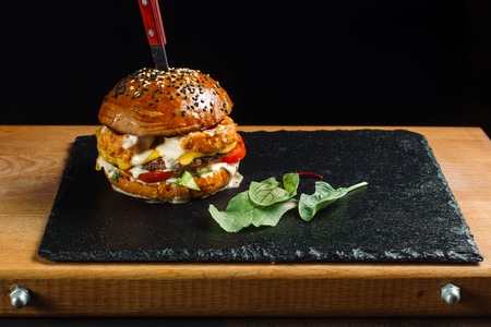 Hamburger with two types of meat, chicken and beef.の写真素材