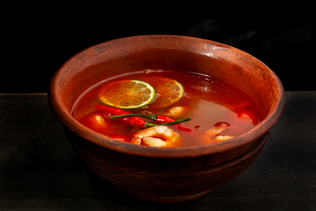 Shrimp soup or Tom Yam goongTraditional food in Thailand contains chili, lime, ginger, galangal, lemongrass, lime leaf.の写真素材