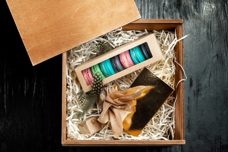 Multi-colored almond macaroni biscuits in a big gift box.の写真素材