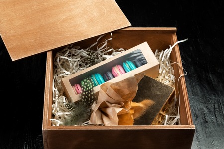 Multi-colored almond macaroni biscuits in a big gift box.の写真素材