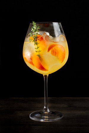 Alcoholic cocktail with orange slices and ice-2.の写真素材