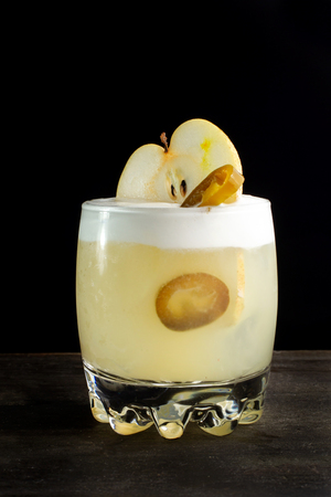 Cocktail with pear and jalapeno pepper in a glass.の写真素材