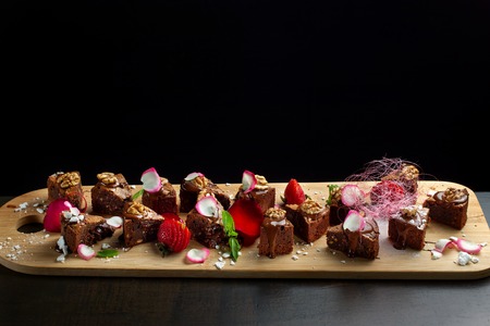 Homemade chocolate brownies or chocolate cakes with nuts.の写真素材
