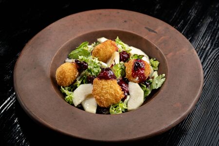Tasty Homemade Cheese Donuts Jam, poured with pear and salad.の写真素材