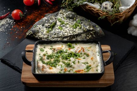 Cheese casserole with chicken and herbs. Beautiful baked crust.の写真素材