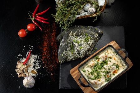 Cheese casserole with chicken and herbs. Beautiful baked crust.の写真素材