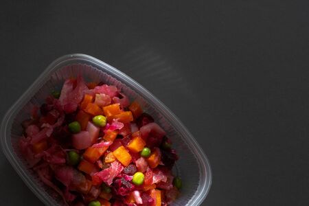Traditional Russian salad vinaigrette watered with oil, christmas menu.の写真素材
