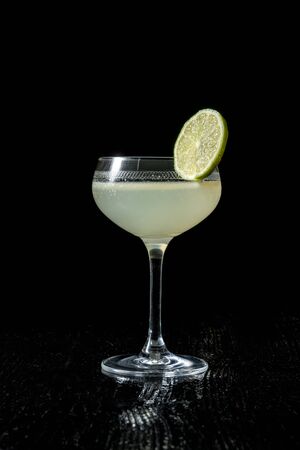 Classic daiquiri on the dark background. Luxury craft drink.の写真素材