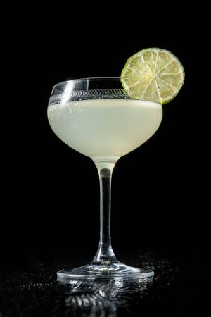 Classic daiquiri on the dark background. Luxury craft drink.の写真素材