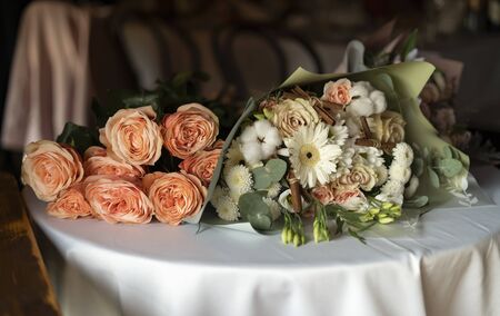 Bouquet of pink roses on a table, contrast sunlight.の写真素材