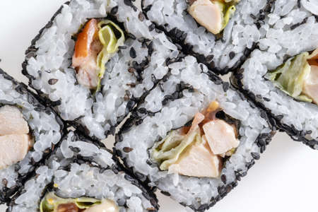 Caesar rolls with sesame seeds, chicken, mayonnaise and nori. Set of rolls shot from above.の写真素材