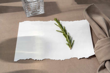A plate with a white sheet on it. Wedding table with seating for guests.の写真素材