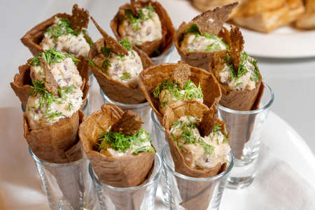 Luxurious catering table. Rolls with filling and croutons.の写真素材