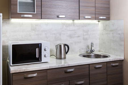 Simple, cheap kitchen in a rented apartment.の写真素材