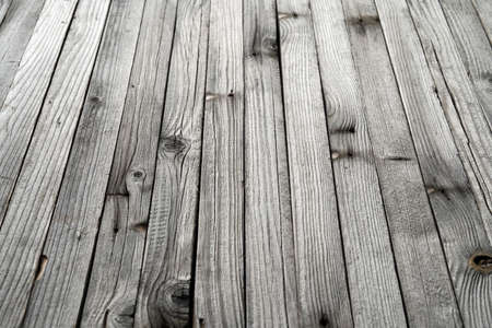 Aged reclaimed wood, beautiful rustic background made of old boards.の写真素材