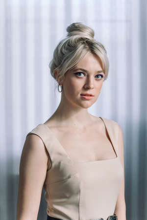Close up studio portrait of a pretty blonde woman.の写真素材