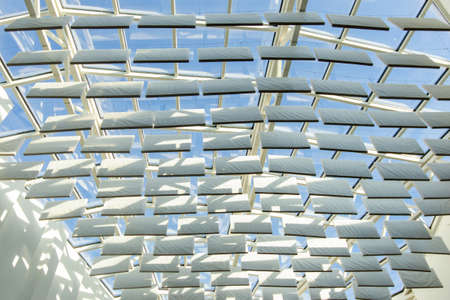 Sun shade or sun reflector, shades the building from the sun. Beautiful white reflectors.の写真素材