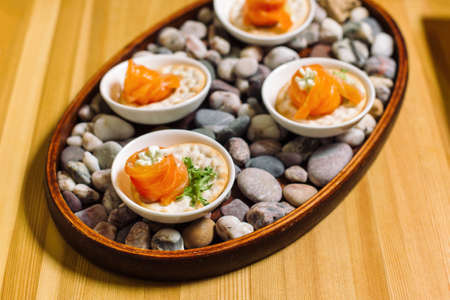 Smoked salmon rolls with cream cheese. Luxury catering-2.の写真素材