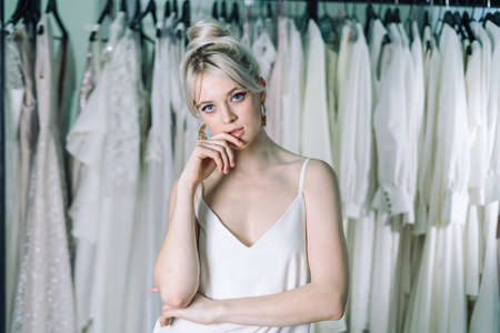 Portrait of young and beautiful blond girl, in one nightie.の写真素材
