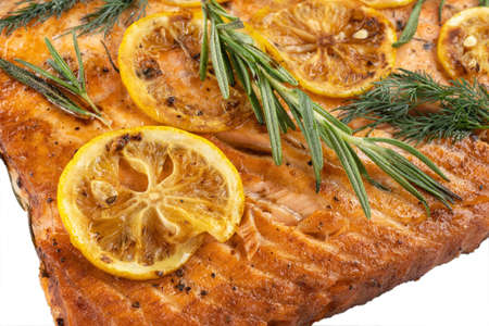 Salmon with lemon steak, decorated with rosemary.の写真素材