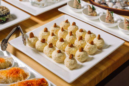 Homemade Cheese appetizer for Cretan. Cheese balls and nuts.の写真素材