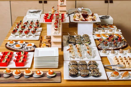 Mini burgers with meat on the table prepared for the guests of the event. Catering and guest meals during the event2.の写真素材