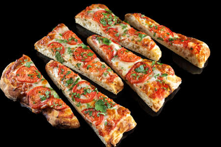 Pizza with tomatoes and parsley, 45 view. Rectangular pizza