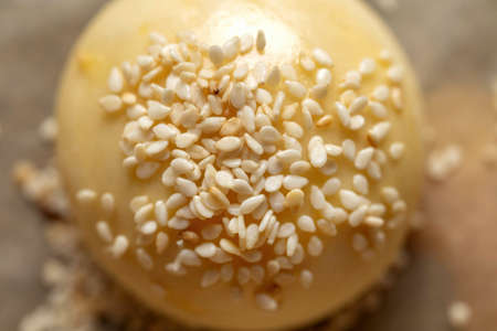 Hamburger bun with sesame seeds Shallow depth of field.