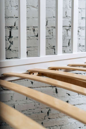 Close-up wooden elements of an arthopedic base of a bed.の写真素材