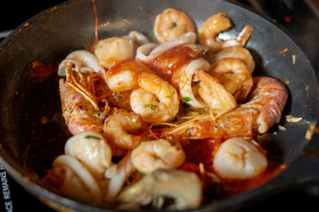 Stir-fried seafood, shrimps and squid. Asian food styleの写真素材